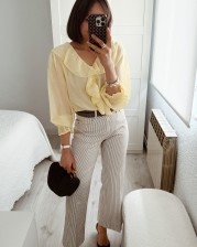 Blusa volante amarilla