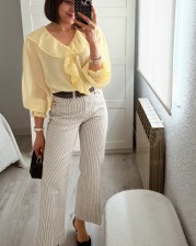 Blusa volante amarilla