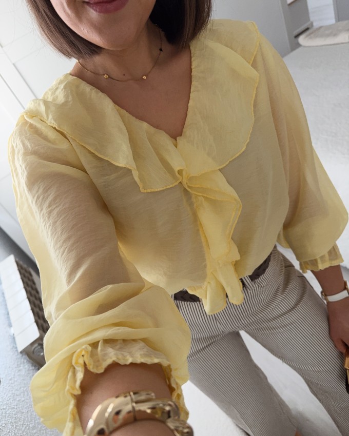 Blusa volante amarilla