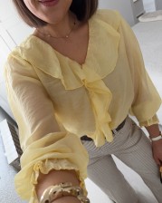 Blusa volante amarilla