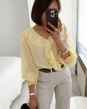 Blusa volante amarilla